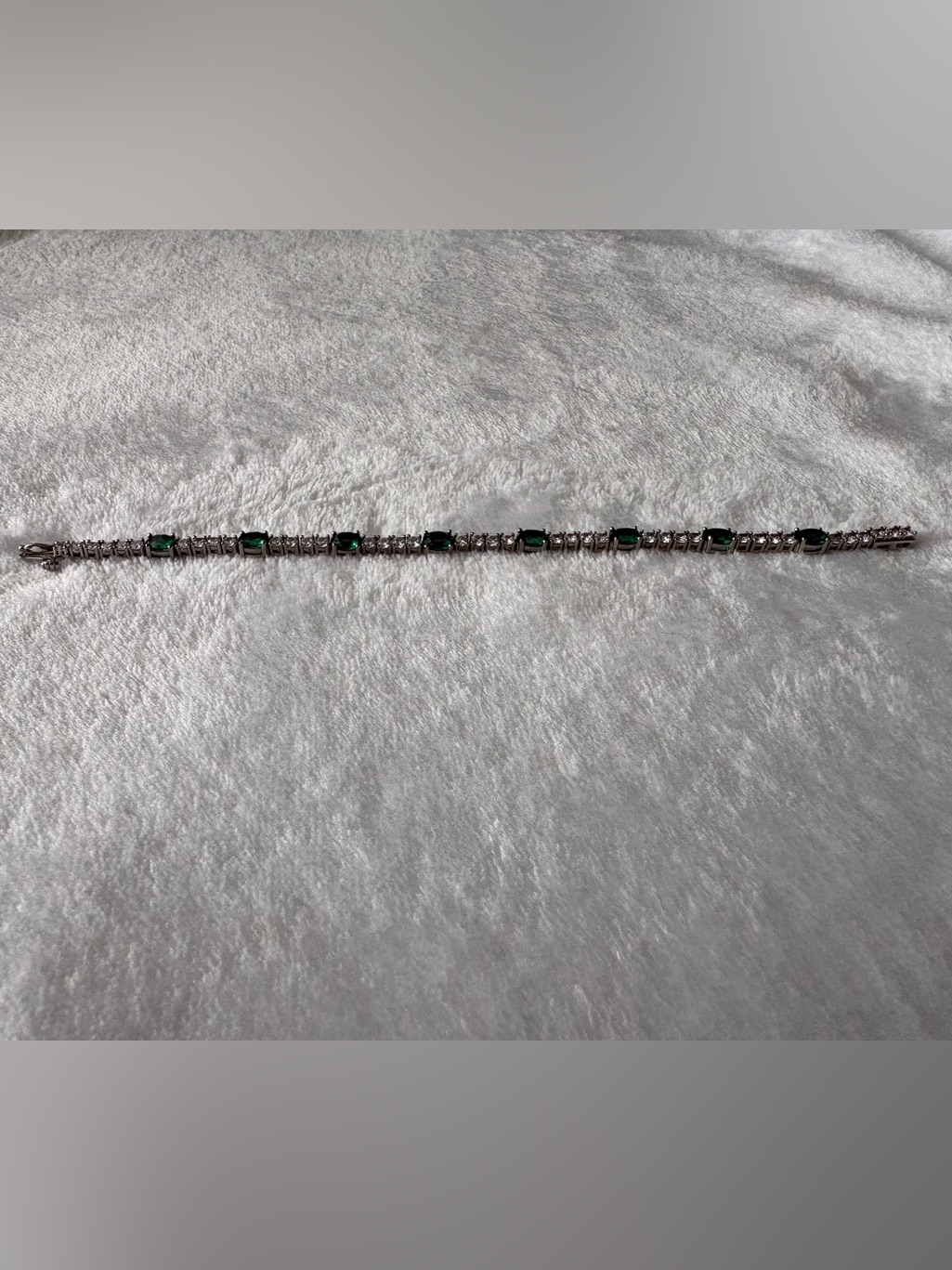 Oval Emerald And White Sapphire Quartet Line Bracelet In Sterling Silver